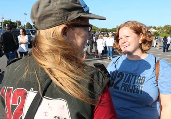 U2 Tattoo Project creator Beth Nabi interviews a tattooed U2 fan.